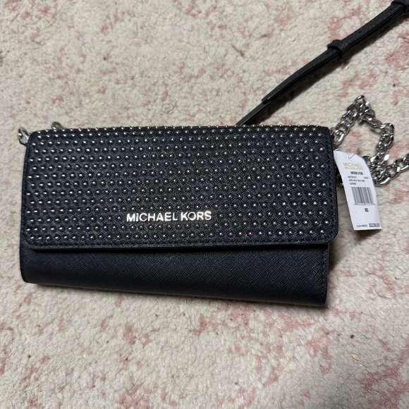 Michael Kors clutch — never used - Picture 1 of 3